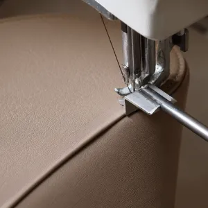 Machine stitching leather at L'Artisan